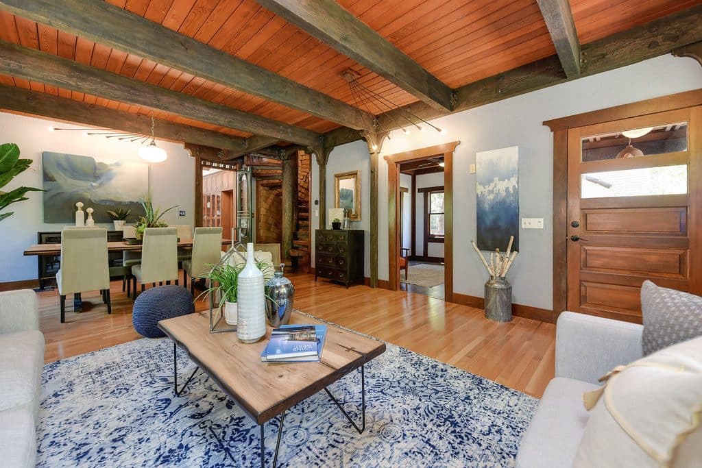 A great room with exposed wood beams